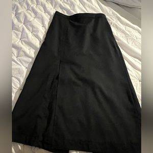 COS size 12 black wool skirt. With front n back slits and side pockets